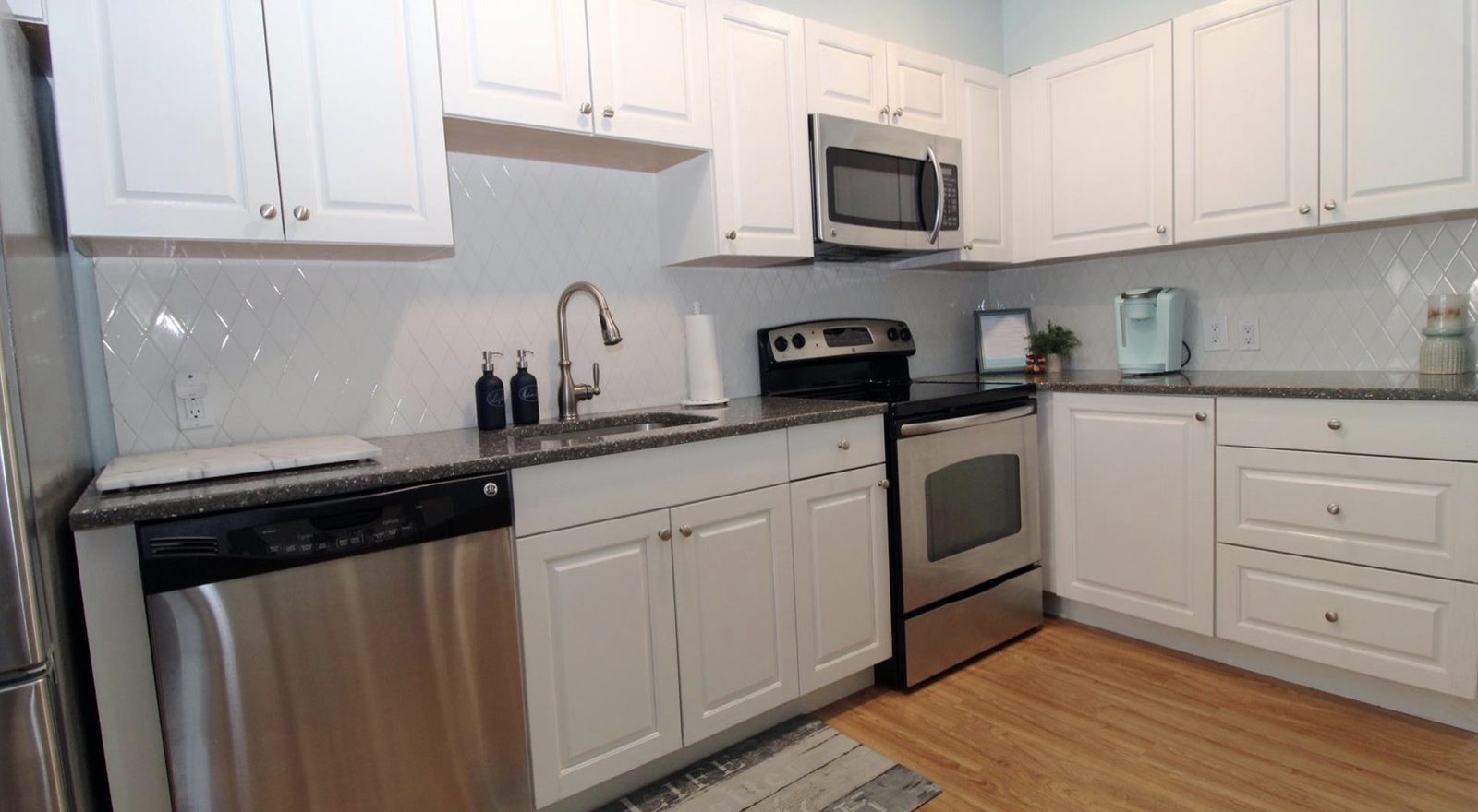 Kitchen with stainless appliances and a Keurig